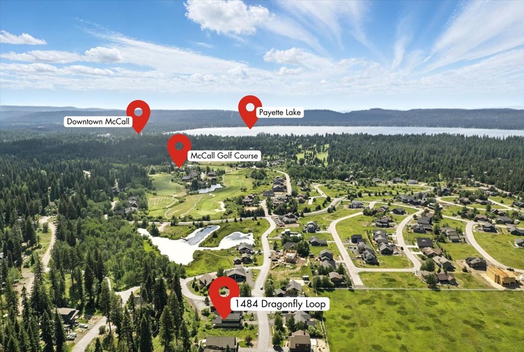 Aerial view of 1484 Dragonfly Loop in McCall, Idaho, highlighting its prime location near the McCall Golf Course, Downtown McCall, and Payette Lake. This McCall real estate property sits in a scenic mountain neighborhood surrounded by pine trees and recreational amenities, showcasing the town’s natural beauty and close proximity to outdoor attractions.